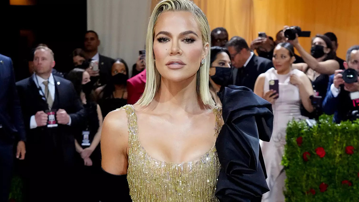 Khloe considering breast implants for “ample cleavage”