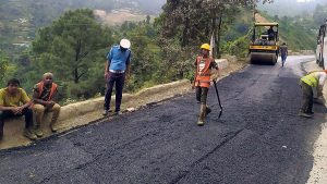 Pokharebagar-Chitre road being blacktopped