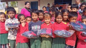HELP NEPAL Network Distributes Track Suits to Students, Ensuring Smiles and Well-being