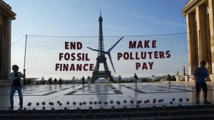 Macron calls for massive investment to respond to climate emergency and poverty