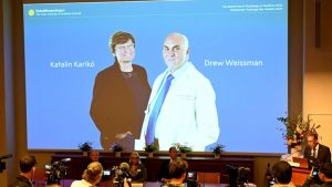 Hungarian and US scientists win medicine Nobel for Covid-19 vaccine discoveries