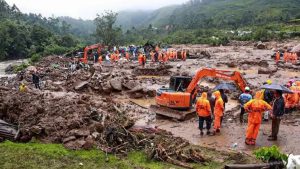 Ninety-three killed, dozens trapped in India landslides